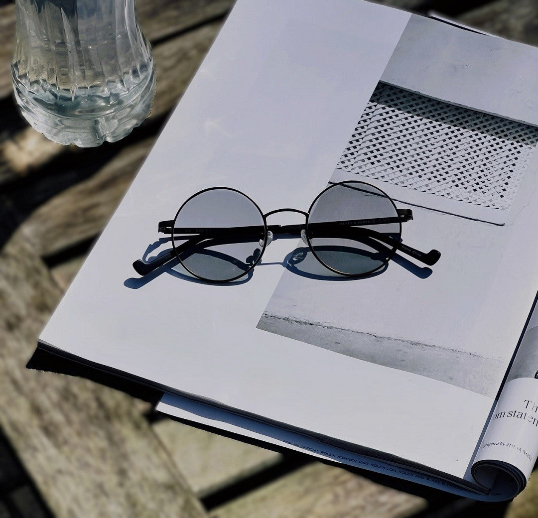 Premium reading glasses with transition lenses in titanium frames Renee's Readers