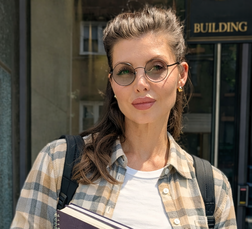 woman wearing tinted round reading glasses- Renee's Readers
