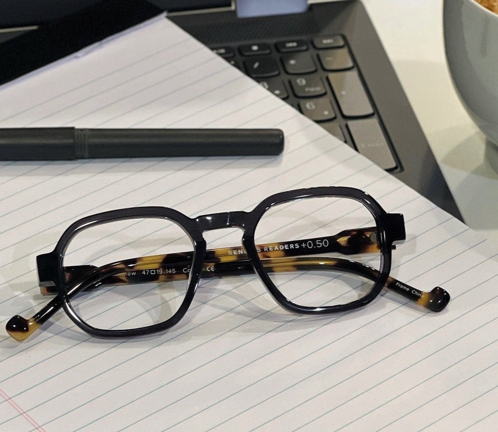 Black and tortoiseshell glasses - on a computer Renee's Readers