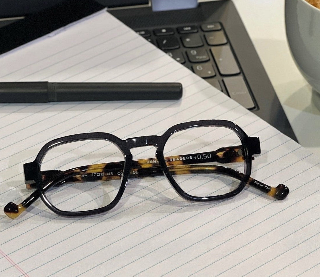 Black and tortoiseshell glasses - on a computer Renee's Readers